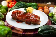 Costilla de Cerdo en Salsa BBQ: Historia y Receta para Conquistar Paladares