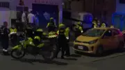 Taxista ebrio atropella a cuatro policías en procedimiento en Bogotá