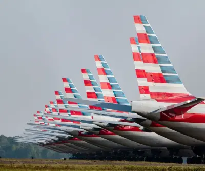American Airlines baja previsiones por alza de combustible