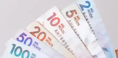 Fiscalidad salarial en la OCDE sube en 2025, Colombia destaca con cuña del 0%