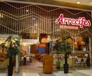 Arrecifes celebra 21 años reinventando la gastronomía caribeña en Bogotá