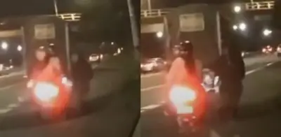 Video: ladrón roba bolso a mujer en moto en Medellín y casi la hace caer