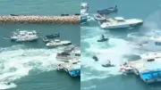 Incendio consume barco en puerto de Qingdao, China; residentes arriesgan su vida en motos acuáticas